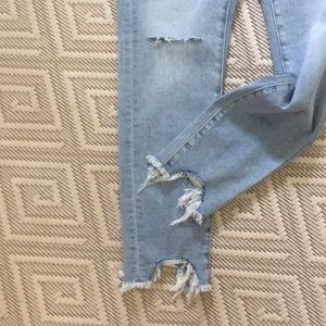 Women’s High Waist Skinny faded/frayed jeans.